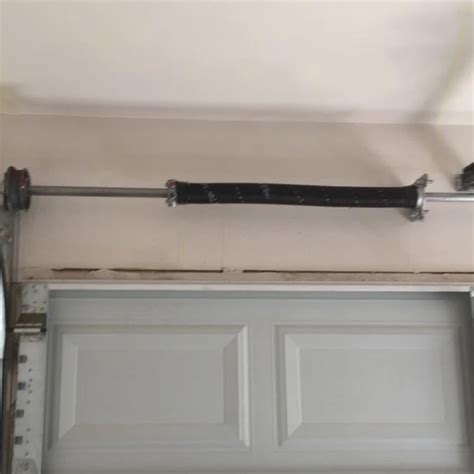 Garage Door Torsion Springs Pair Of With Winding Bars And Bearings 207 X 2 X 25 Ebay