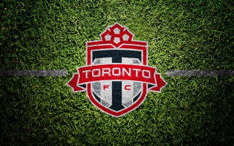 Download The Official Logo Of Toronto Fc Emblazoned In Vibrant Red