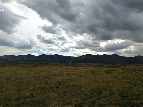 Cloudy Sky with Mountains – Photos Public Domain