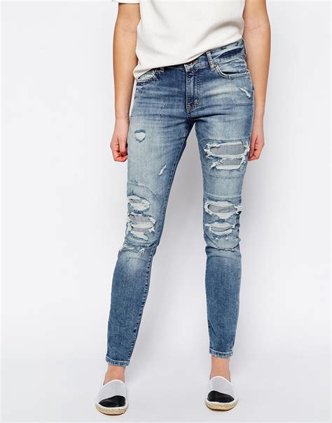 Vero moda Ripped Jeans in Blue | Lyst