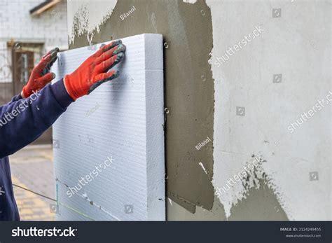 Construction Worker Installing Styrofoam Insulation Sheets Stock Photo ...