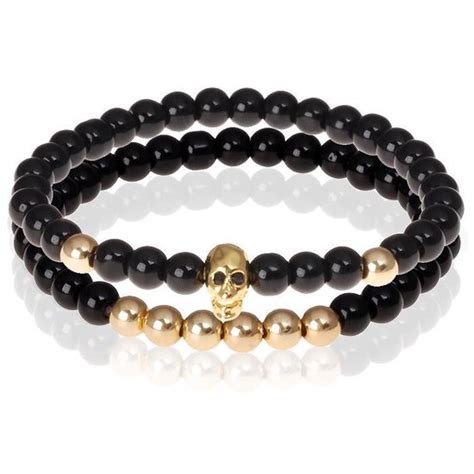 Zwarte Onyx Kralen Armband Goudkleurige Skull Bol