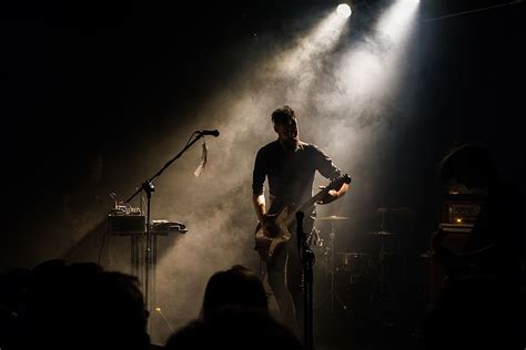 HD wallpaper: Man Playing Guitar in Front of People, audience, band ...