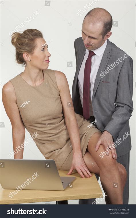 Suave Balding Businessman Groping His Secretaryarkivfotografi178986338