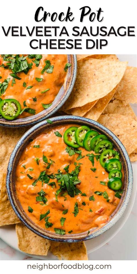 Two Bowls Of Crock Pot Velveeta Sausage Cheese Dip With Tortilla Chips On The Side