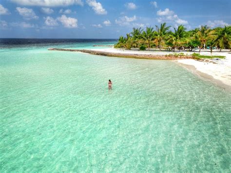Female In A Bikini On A Picturesque Tropical Beach In The Maldives Stock Photo Image Of Bikini