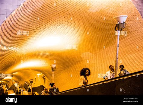 People Use The Escalators In The Baixa Chiado Metro Station In Lisbon