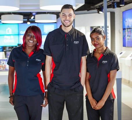 Argos reveals new staff uniforms to reflect the growing role of technology in the store ...