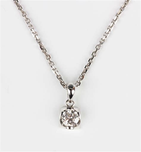 A White Gold And Diamond Single Stone Pendant Detailed Weight