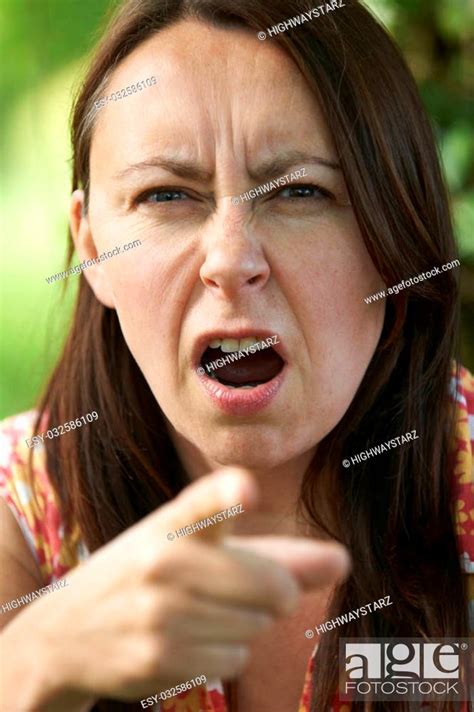 Angry Middle Aged Woman Pointing At Camera Stock Photo Picture And