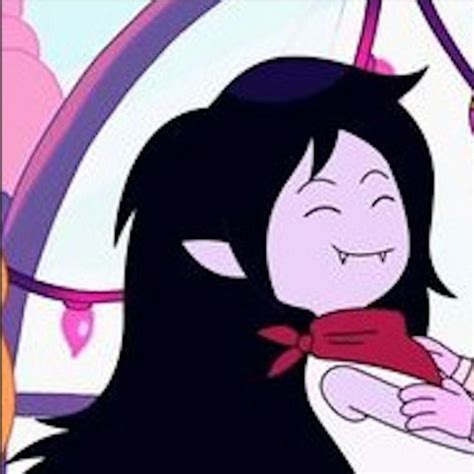 an animated image of a girl with long black hair wearing a red bow tie and smiling