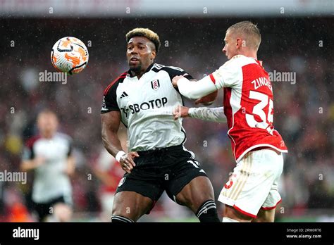 Fulham S Adama Traore Left And Arsenal S Oleksandr Zinchenko Battle