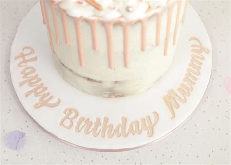 Rose Gold Drip Cake Topped With Treats Cakey Goodness