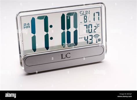 Clear Radio Controlled Alarm Clock With Thermometer Stock Photo Alamy