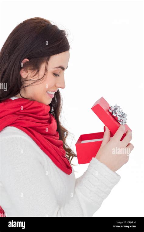 Smiling Brunette Opening Christmas Present Stock Photo Alamy