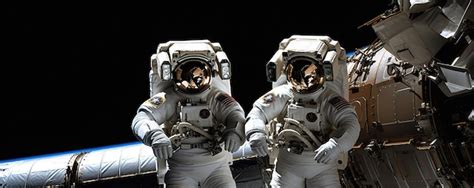 astronauts working   international space station premium