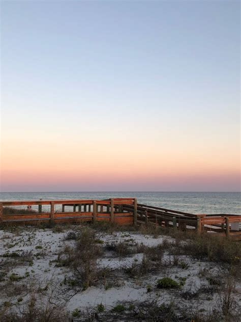 Sunset on beach boardwalk | Beach sunset, Beach boardwalk, Sunset