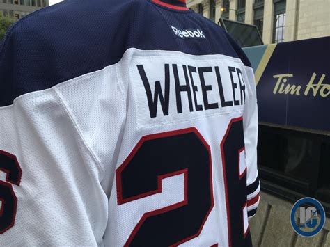 A close up look at the Winnipeg Jets Heritage Classic jersey | Illegal Curve Hockey