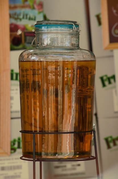 Premium Photo Apple Juice In Glass Bottle