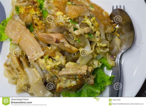 Stir Fried Flat Noodle And Chicken And Egg Thai Street Food Stock Image