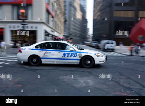 An Nypd Chevy Impala Police Cruiser On Broadway In Manhattan Ny Stock