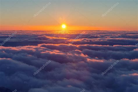 Beautiful sunset Above clouds — Stock Photo © kamchatka #83247866