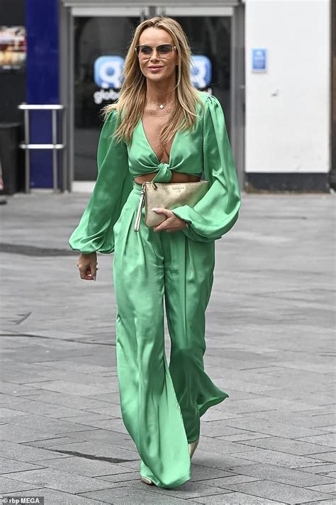 Amanda Holden Flashes Her Cleavage In A Plunging Satin Green Jumpsuit As She Departs Heart Radio