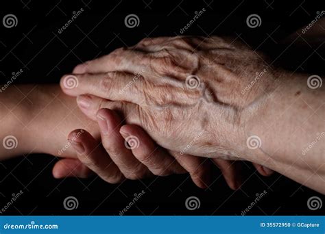 Granddaughter And Grandmother Holding Hands Stock Photo Image Of