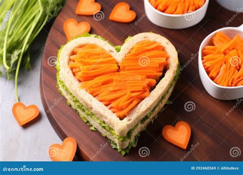 Heart Shaped Sandwich With Carrot Slices Around It Stock Image Image