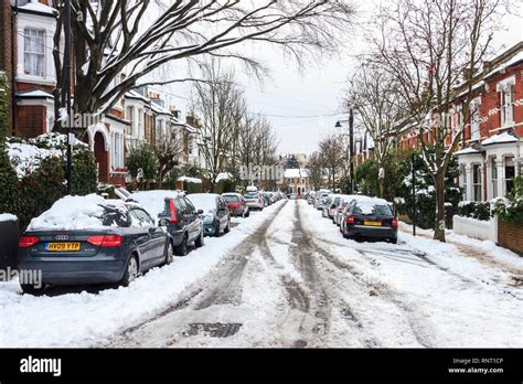 Snowy Conditions In A Residential Area Of Islington North London Uk