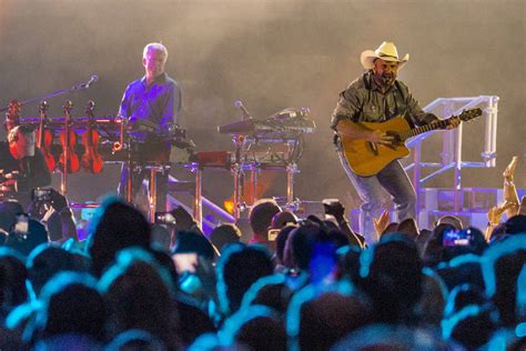 Garth Brooks performs before the crowd at Allegiant Stadium on Friday ...