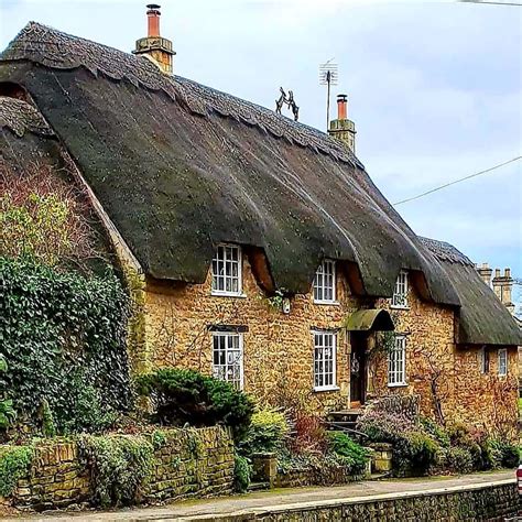 My favourite thatch cottage with the Hares on the roof in Ebrington, a ...