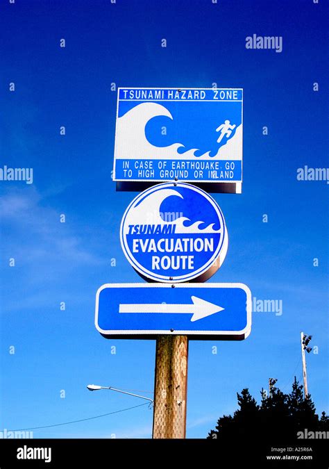 Tsunami Warning And Evacuation Direction Signs On Oregon State Highway