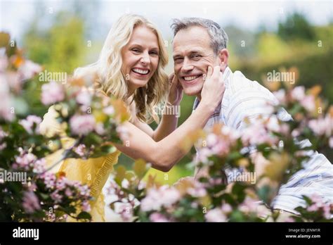 Happy couple hugging Stock Photo - Alamy