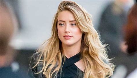 Amber Heard Evades Question On Johnny Depp Trial With Smile