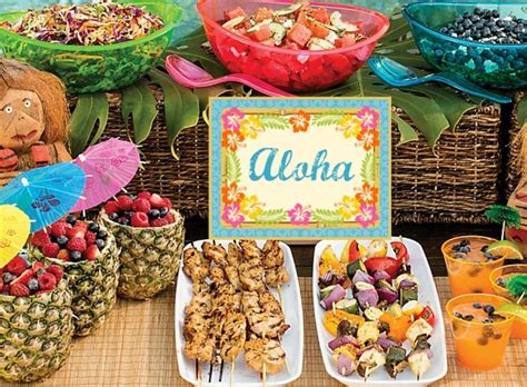 A Table Topped With Lots Of Food Next To Cups And Plates Filled With