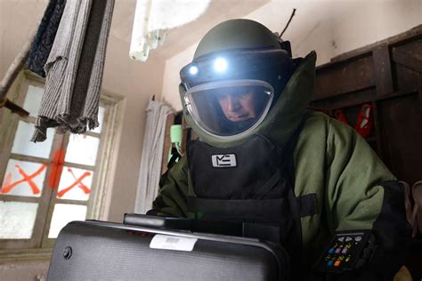 A Sailor Assigned To Explosive Ordnance Disposal Mobile Unit EODMU 3