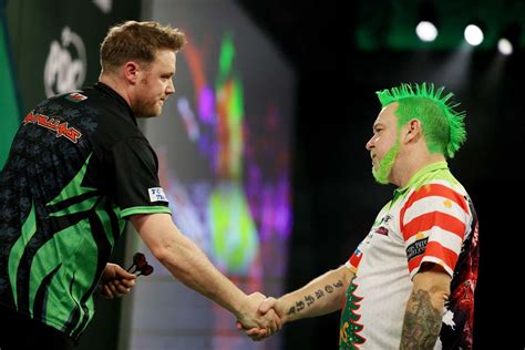 PDC World Championship: Two-time champion Peter Wright suffers early ...