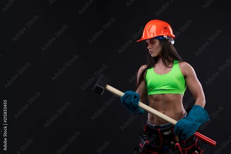 Sexy Female Miner Worker With Pickaxe In Coveralls Over His Naked Body