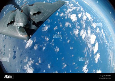 A KC-135 Stratotanker refueling a B-2 Spirit Stock Photo - Alamy