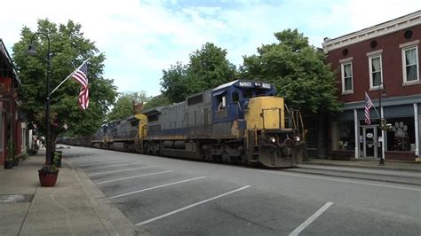 A CSX train literally drives right down the main street of downtown La ...