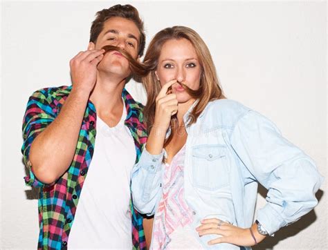 Smoking Tobacco And Portrait Of Hipster Couple With White Wall