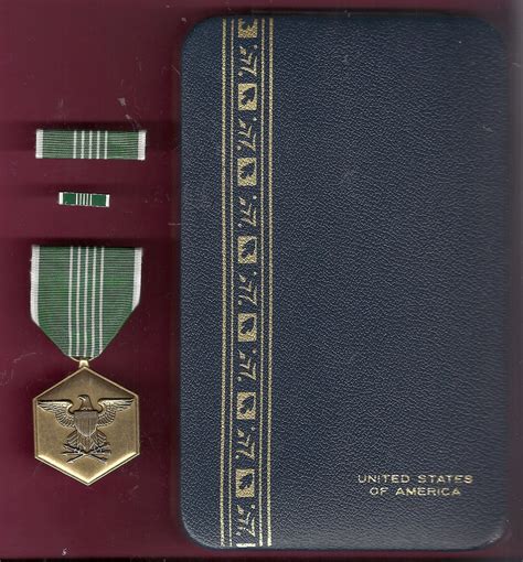 Army Commendation medal in case with ribbon bar and lapel pin