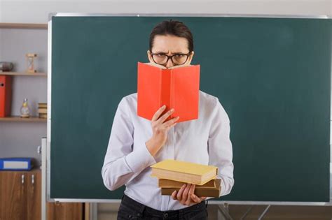 Free Photo Young Woman Teacher Wearing Glasses Explaining Lesson