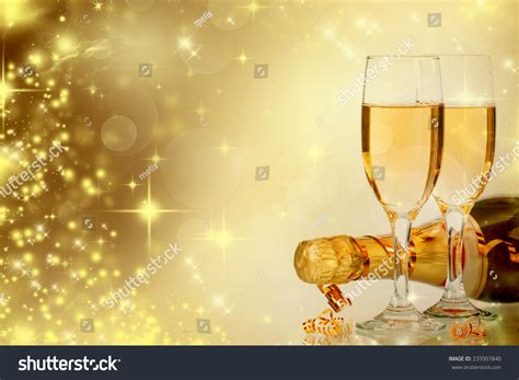 Glasses Champagne Bottle Over Sparkling Holiday Stock Photo 237007840