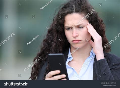 Sad Businesswoman Checking Bad News On Stock Photo 2161777369