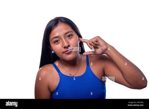 Black Woman Indicating With Her Finger That She Is Deaf Latin Woman Of