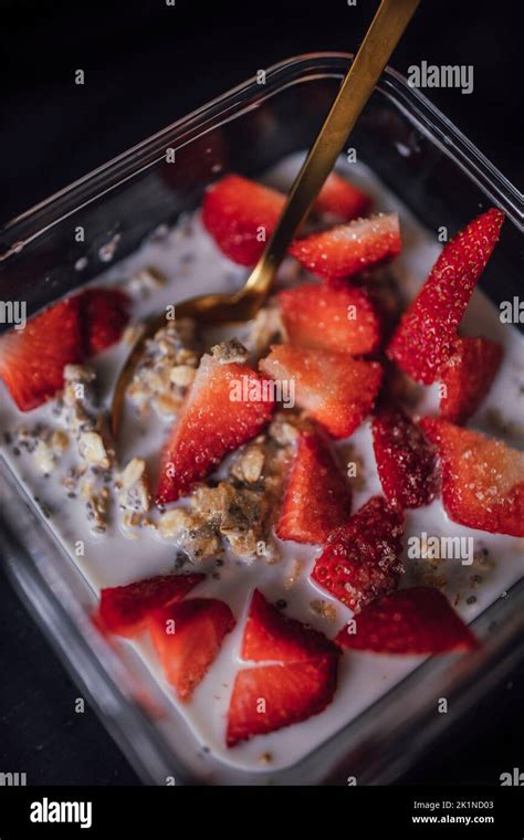 Overnight Oats With Chia Strawberries And Sugar Granules Stock Photo