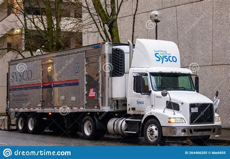 Sysco Delivery Truck Leaves Parking Lot After Delivering Products