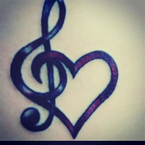 Get Inked: The Secret Behind Music Note Face Tattoos Revealed - See Stunning Designs!